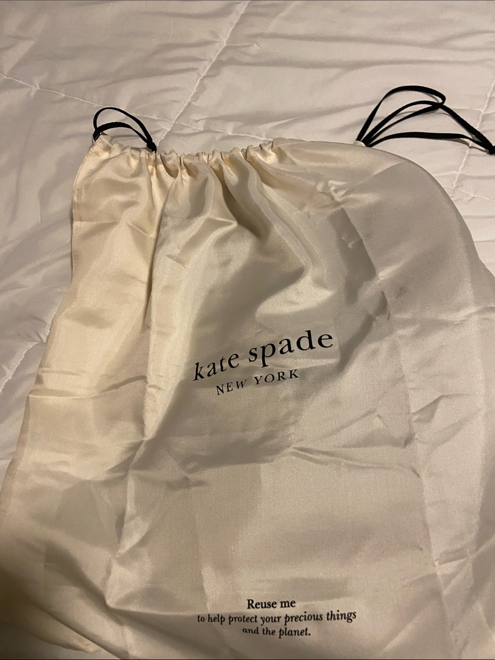 kate spade Cream Drawstring Dust Bag with Black Cord
Brown suede crescent hobo